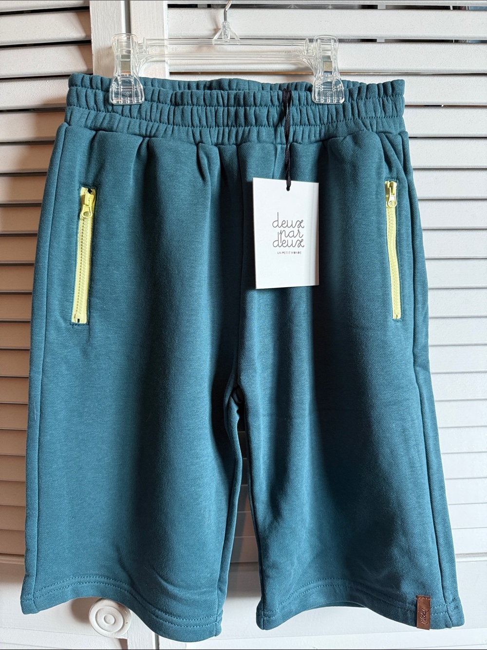 deux par deux teal shorts with yellow zippers